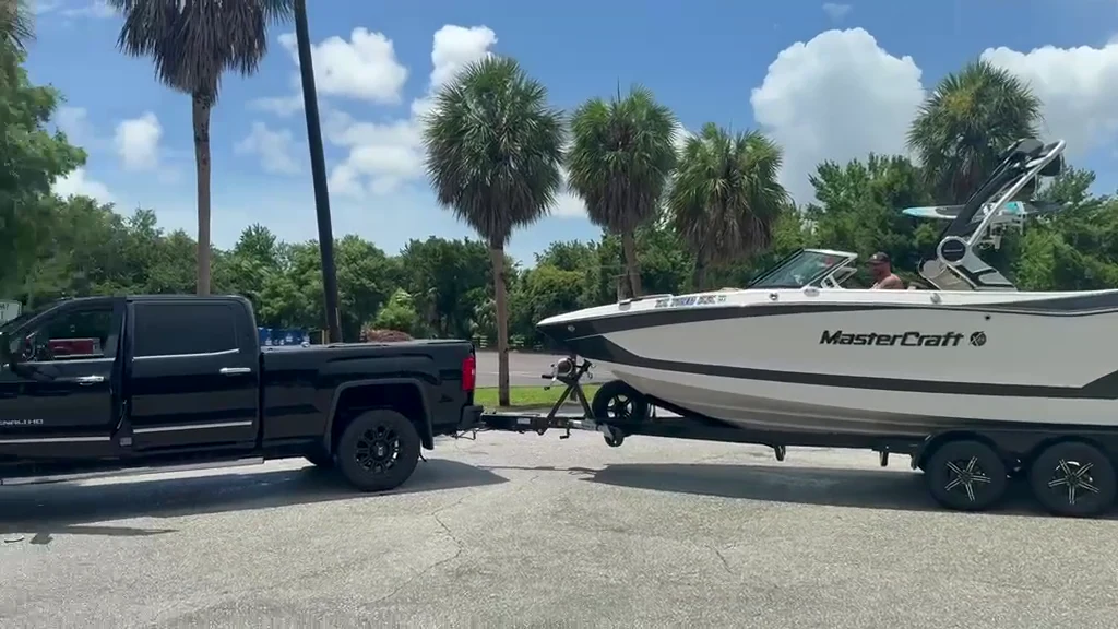 The wake boat on its trailer